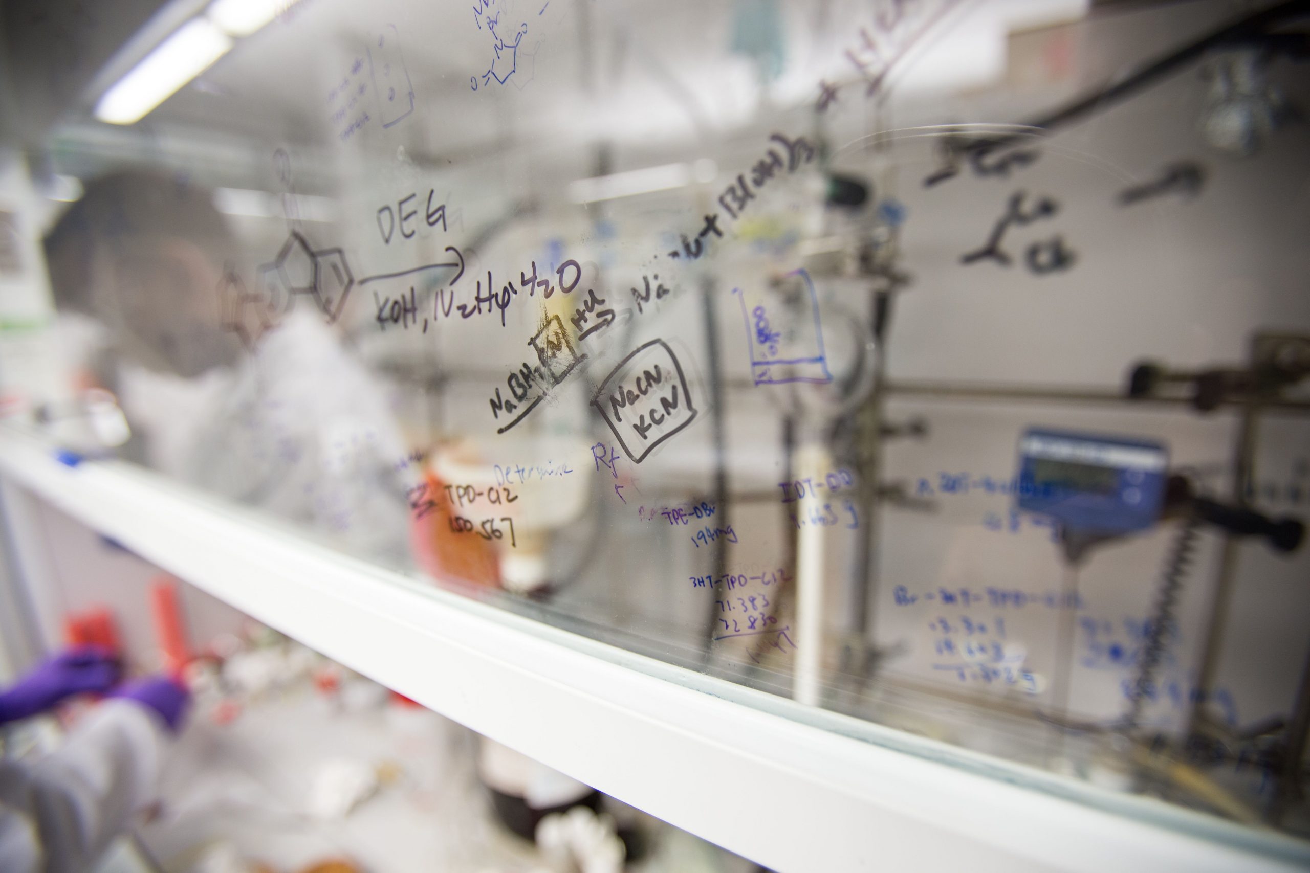 Chemical reactions sketched on whiteboard