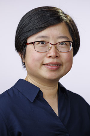 Xueqiu Lin in a blue shirt.