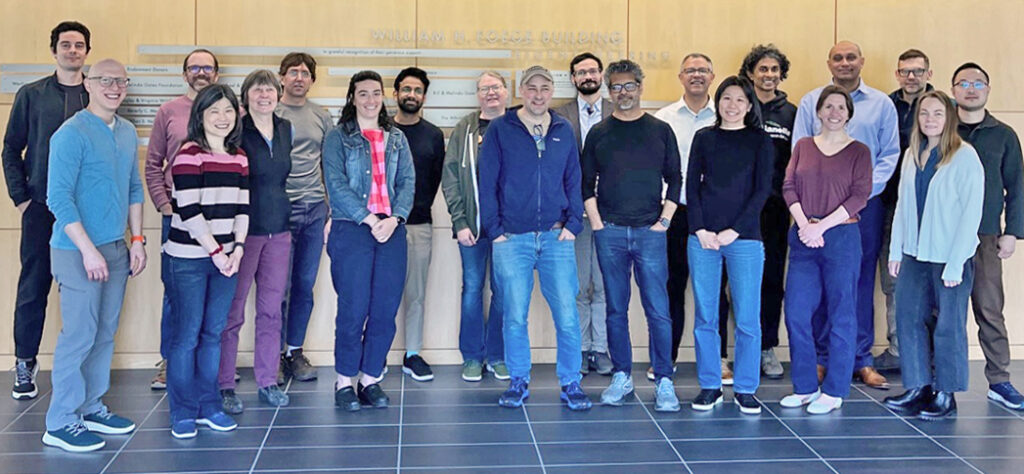 Microbial researchers standing in a group.